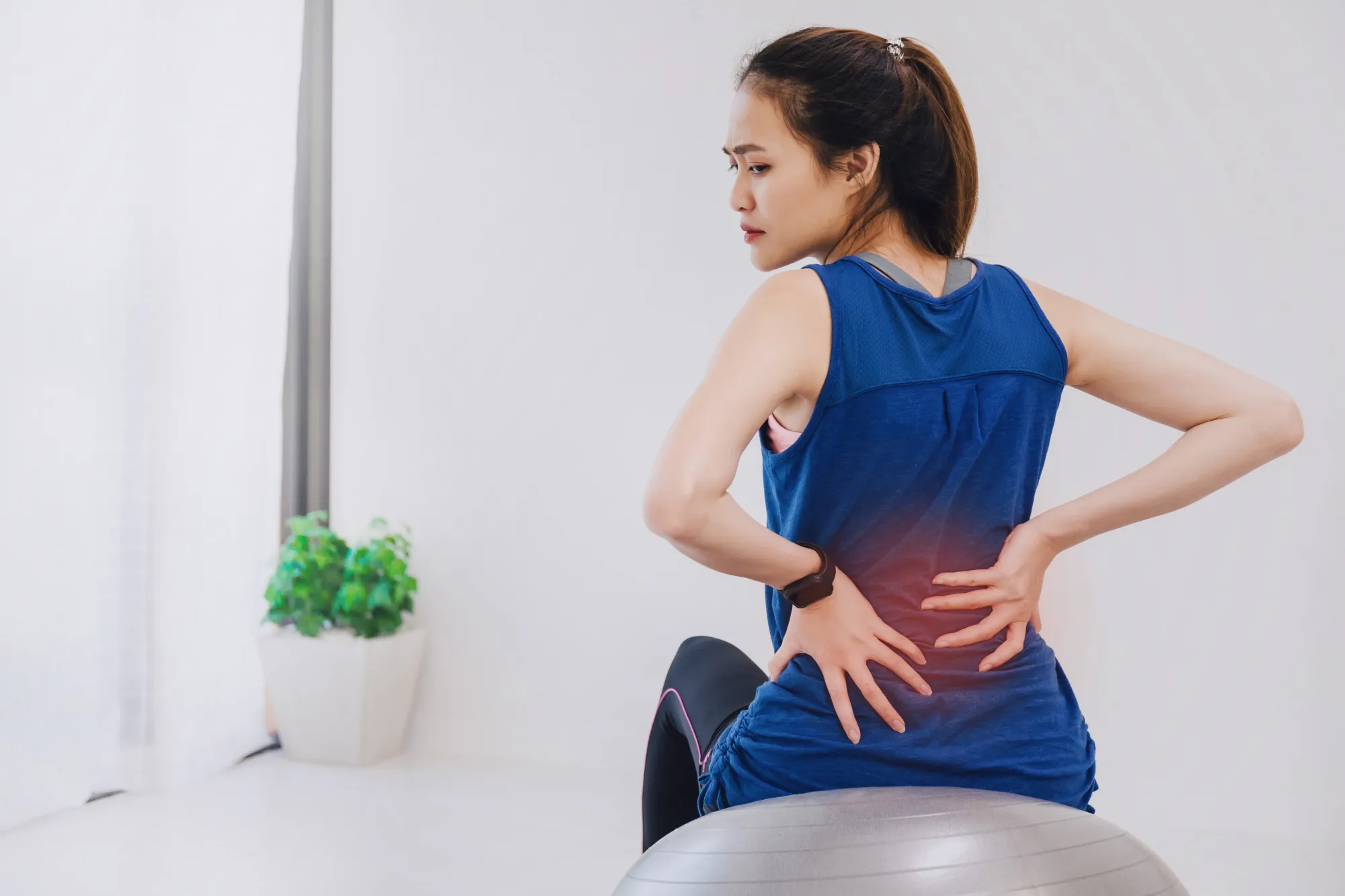 Lady Having back pain photo